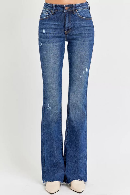 Trendsi plus size distressed flare jeans in dark wash with stylish rips and a flared leg fit