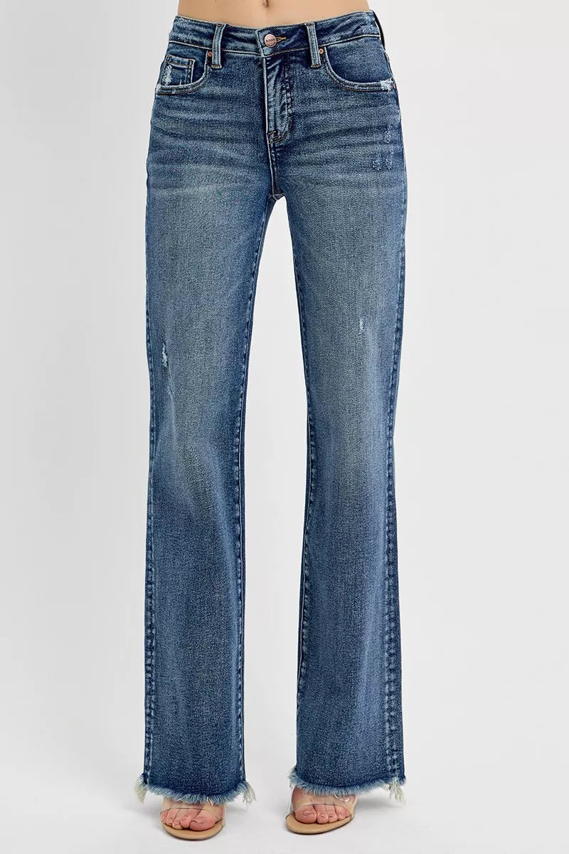 Trendsi plus size tummy control jeans in a stylish faded blue with a flared leg design