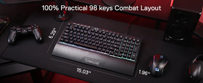 Redragon K515 Shiva gaming keyboard with 98 keys and compact combat layout on black desk