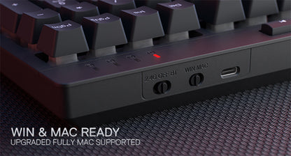 Shophouse Northwest Redragon wireless gaming keyboard closeup showing Win Mac switch USB C port and red LED indicator