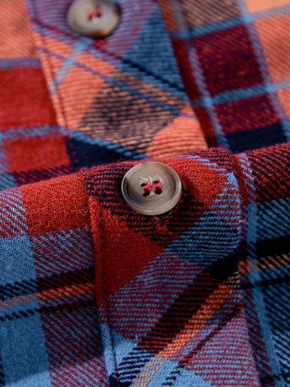 Shophouse Northwest cotton boho plaid shacket close up red blue orange plaid shirt with buttons