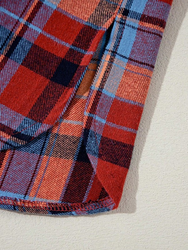 Shophouse Northwest close up of red and blue cotton boho plaid shacket hem and wooden button detail