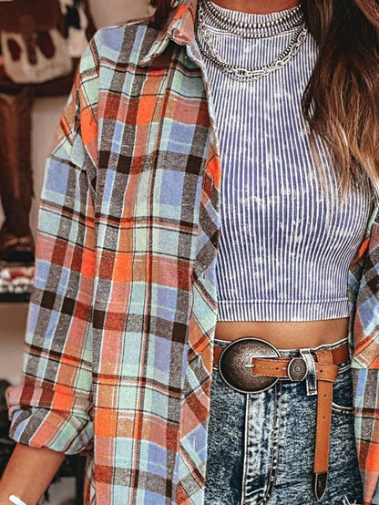 Shophouse Northwest cotton boho plaid shacket worn open over striped crop top with layered necklaces and high waisted denim belt