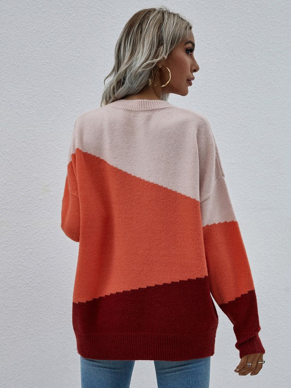 Shophouse Northwest women's long sleeve sweater colorblock diagonal pink orange and burgundy back view