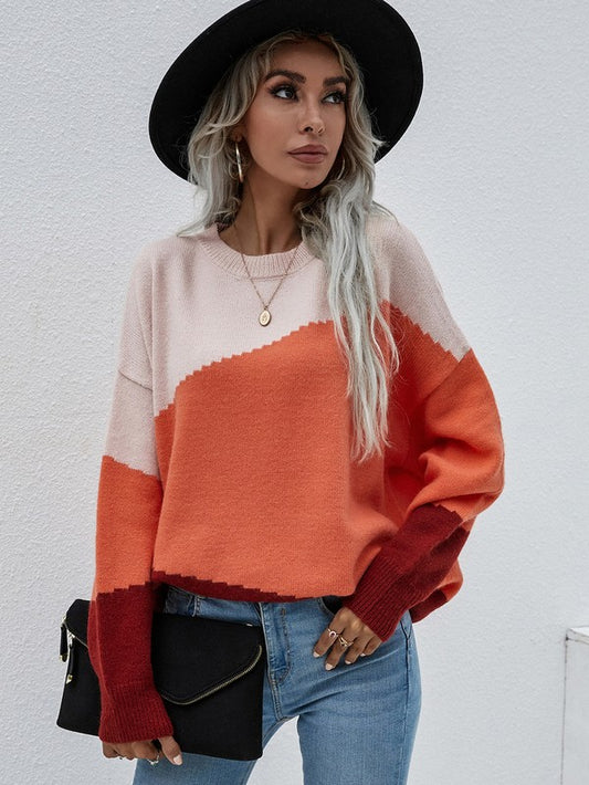 Shophouse Northwest colorblock women's long sleeve sweater in cream orange and burgundy with relaxed fit