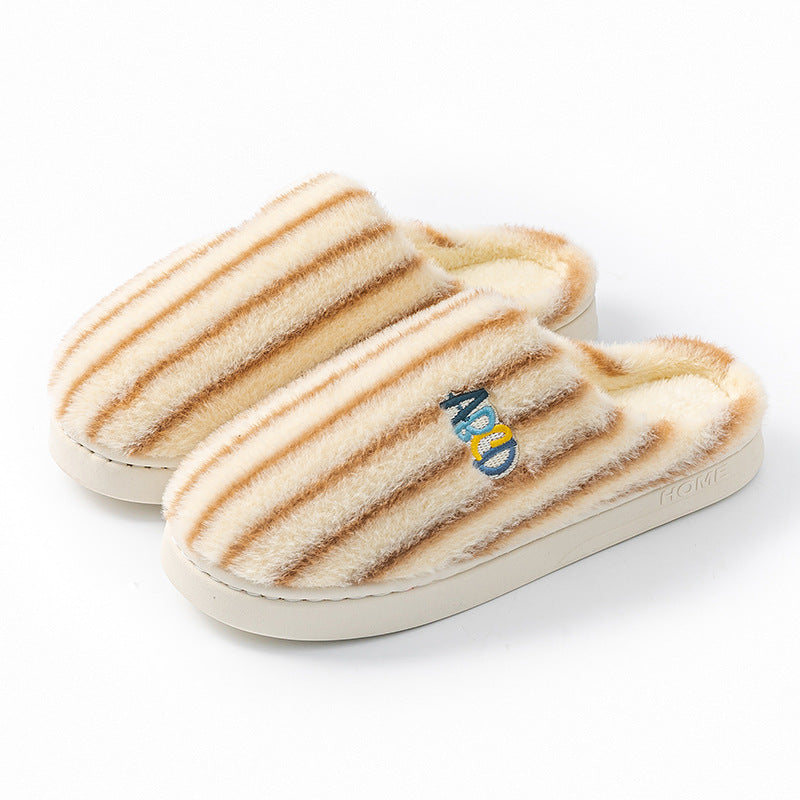Striped plush winter slippers with soft texture and cozy design for indoor comfort