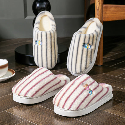 Striped plush winter slippers with soft fabric for cozy indoor comfort in cool weather