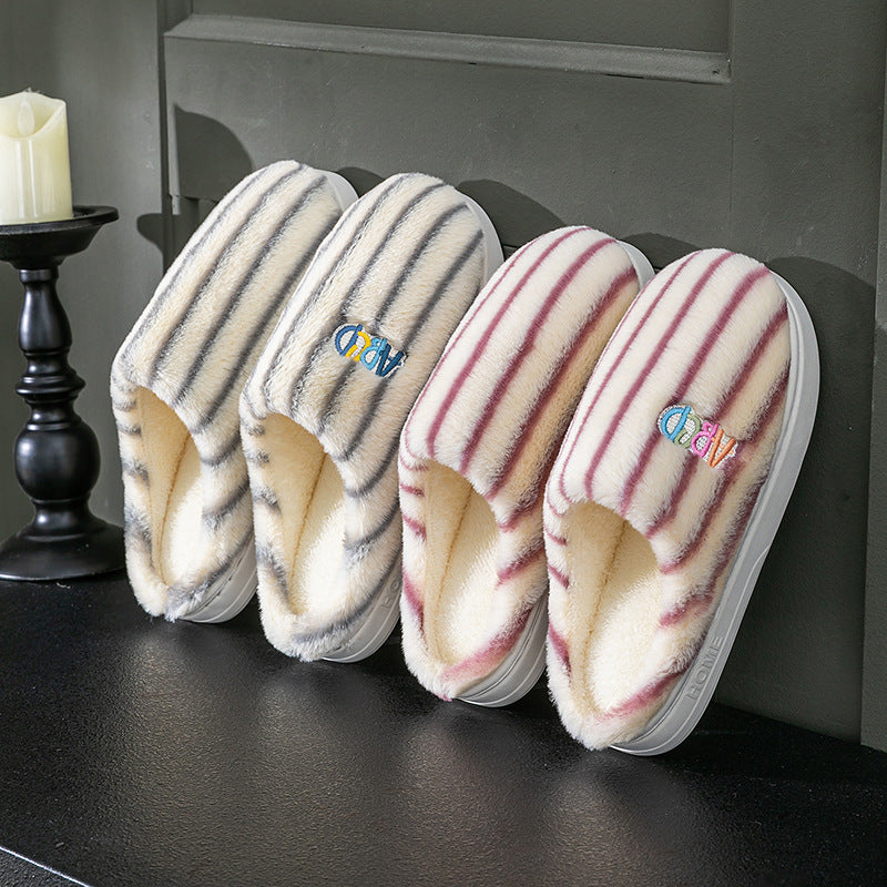 Striped plush winter slippers in various colors for cozy indoor comfort