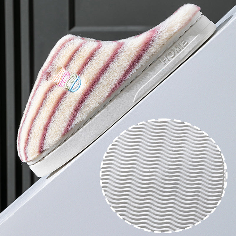 Striped plush winter slippers in soft materials, perfect for cozy indoor wear during cold days