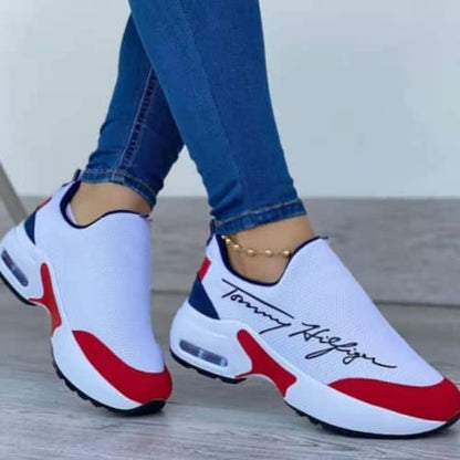 Stylish white and red athletic shoes for women, perfect casual walking shoes for women