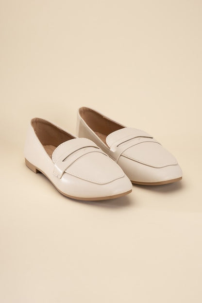 Shophouse Northwest Harriet-8 slip on penny flats shoes in cream leather loafers with low heel and rounded toe