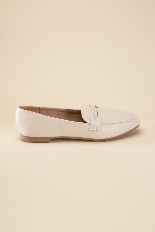 Harriet-8 slip on penny flats shoes Shophouse Northwest beige leather penny loafer flat side profile