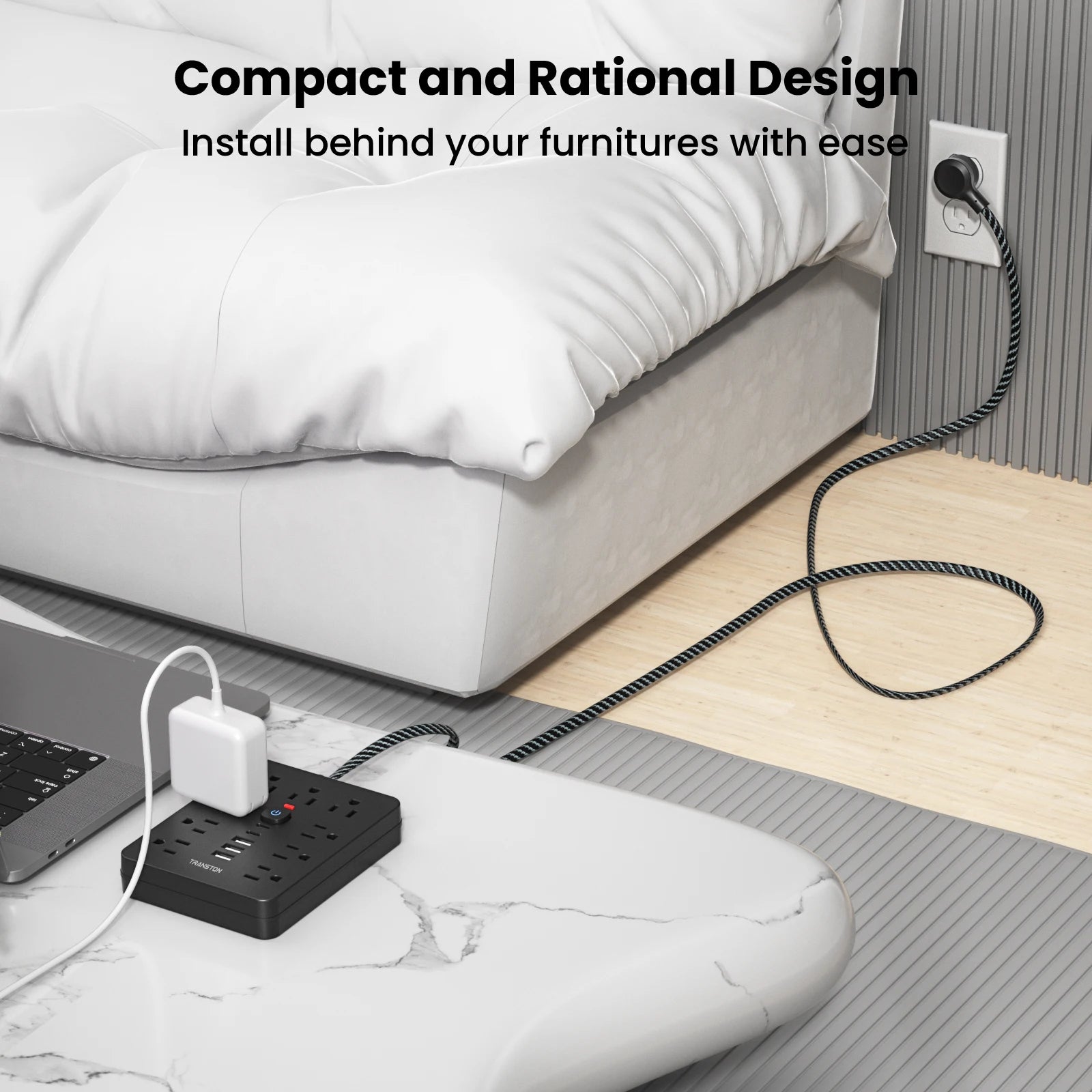 Compact power strip surge protector with USB C installed behind furniture for easy access