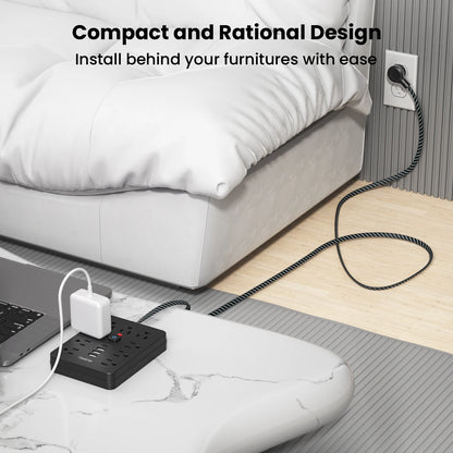 Compact power strip surge protector with USB C installed behind furniture for easy access