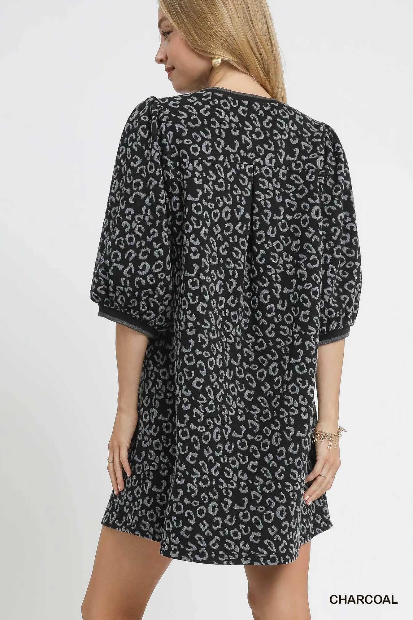 Umgee leopard print mini dress in charcoal color with stylish puff sleeves and a relaxed fit