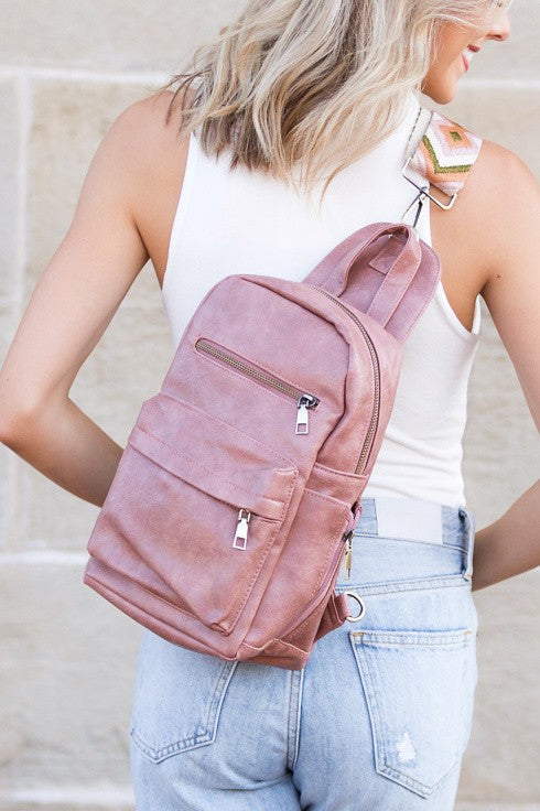 Alba backpack sling convertible bag Shophouse Northwest dusty rose faux leather worn crossbody with front zip pockets