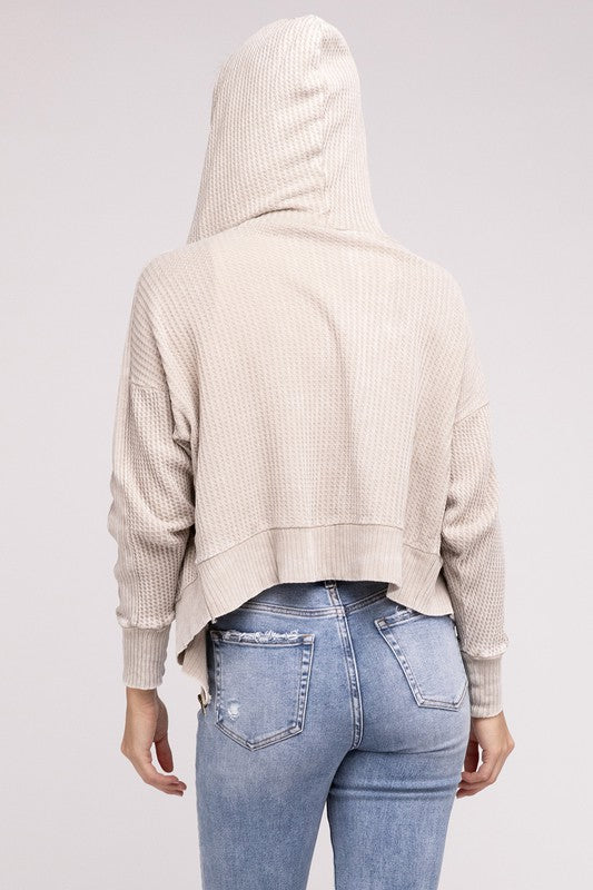 Shophouse Northwest acid wash waffle zip up jacket back view cream waffle hooded cropped jacket paired with jeans