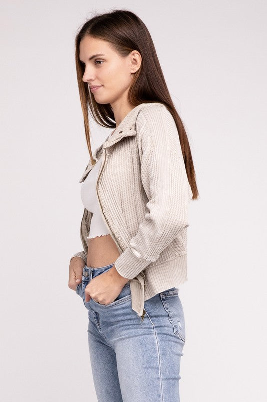 Shophouse Northwest acid wash waffle zip up jacket beige knit cropped bomber style worn over white crop top with jeans