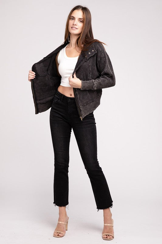 Shophouse Northwest acid wash waffle zip up jacket worn open by model with white crop tank and black jeans