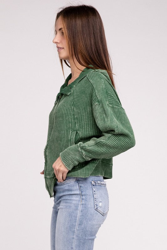 Shophouse Northwest acid wash waffle zip up jacket in green waffle knit with hood modeled side view with jeans