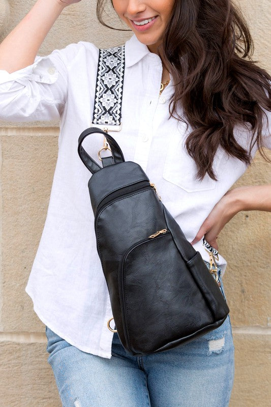 Shophouse Northwest black leather everyday sling bag for women with gold zippers and adjustable strap