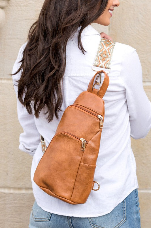 Shophouse Northwest tan leather everyday sling bag for women with embroidered adjustable strap and zip pockets