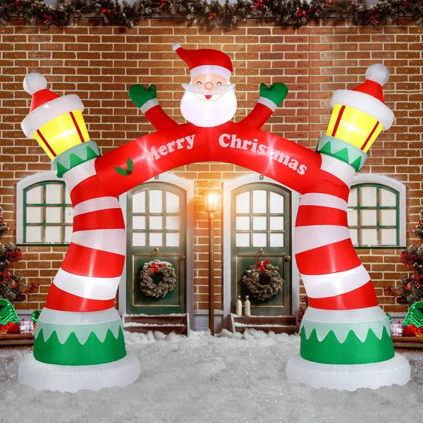 Festive lighted Christmas inflatable archway with Santa and cheerful decorations for holiday displays