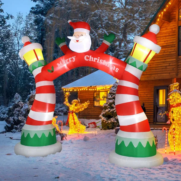 Lighted Christmas inflatable archway featuring Santa and festive decorations for holiday displays