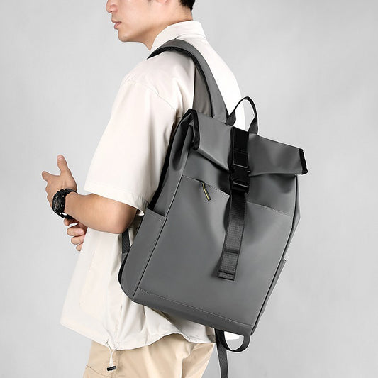 Man wearing a waterproof laptop backpack oxford cloth in stylish gray for everyday use