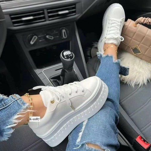 Stylish women's platform sneakers in white, perfect for casual outings and everyday wear