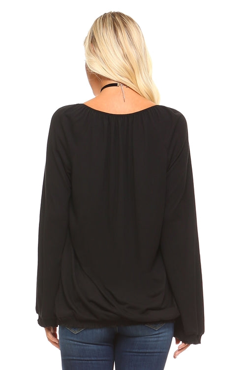 Back view of a women's long sleeve peasant top in black, featuring a relaxed fit and flowing sleeves