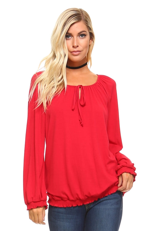 Women's long sleeve peasant top in red with a round neckline and drawstring detail, perfect for casual outings